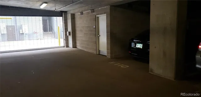 a view of an empty room with a fireplace