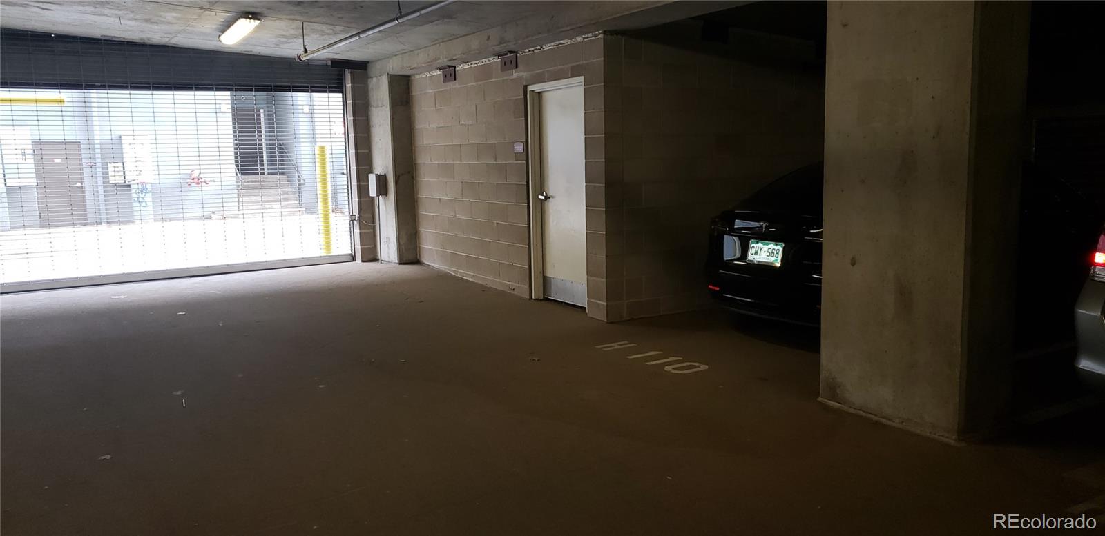 1950 Logan Street Denver, CO 80203 - Photo 5 of 10 a view of empty room with floor to ceiling window