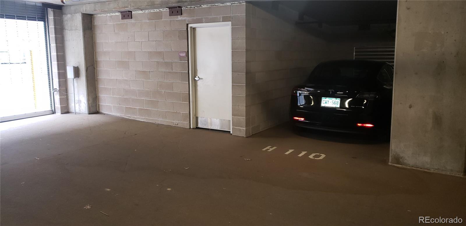 1950 Logan Street Denver, CO 80203 - Photo 6 of 10 a view of an empty room with a fireplace
