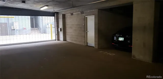 a view of room with a ceiling fan and window