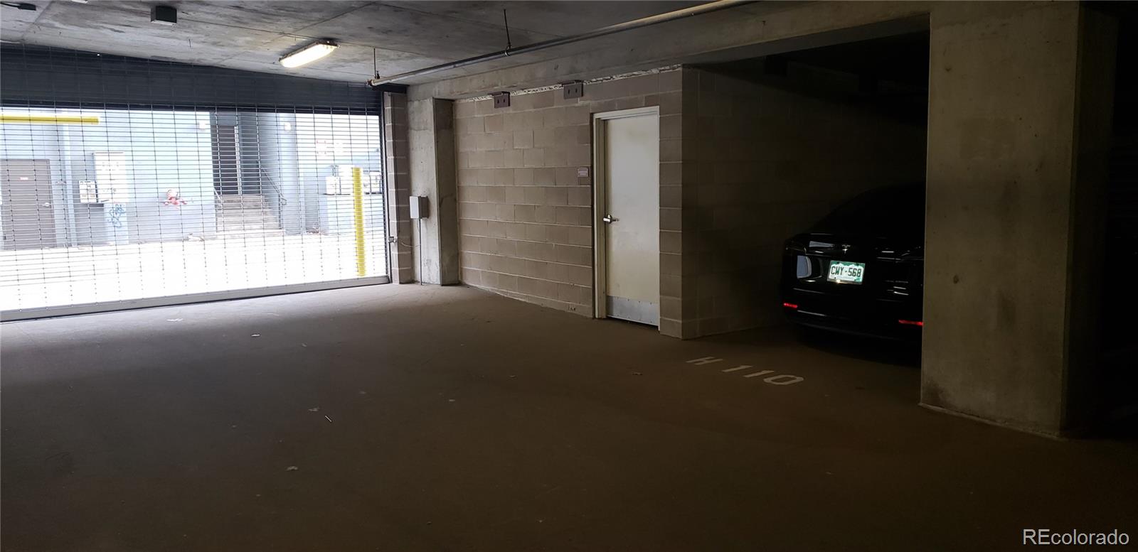 1950 Logan Street Denver, CO 80203 - Photo 7 of 10 a view of empty room with floor to ceiling window