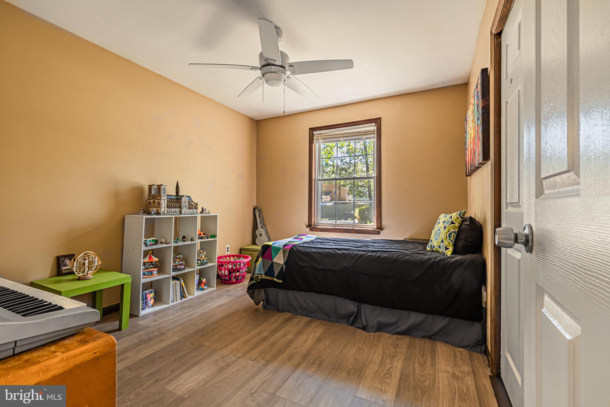 4 Oak Leaf Road Berlin, NJ 08009 - Photo 14 of 18 a bedroom with a bed closet and a window