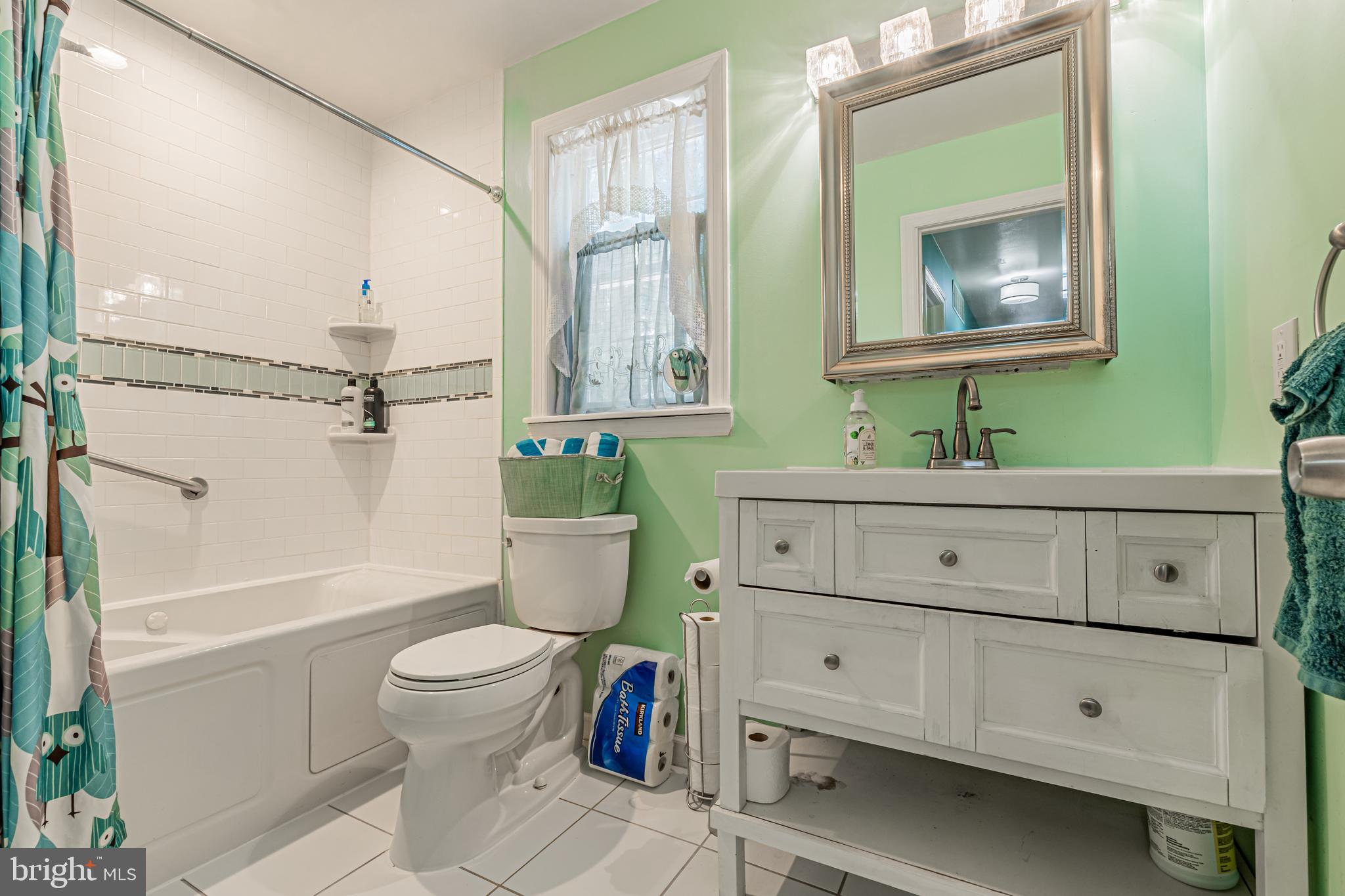 4 Oak Leaf Road Berlin, NJ 08009 - Photo 16 of 18 a bathroom with a toilet a sink and a mirror