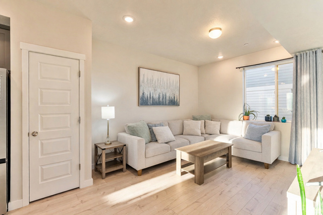 1146 South Redwood Road, Unit 1006 Salt Lake City, UT 84104 - Photo 5 of 19 Living room featuring light wood-style floors and recessed lighting