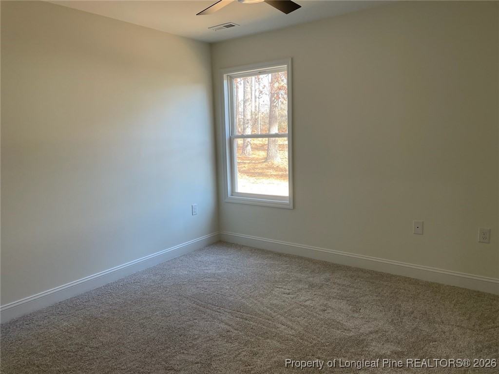 209 August Lane Raeford, NC 28376 - Photo 12 of 20 an empty room with a window