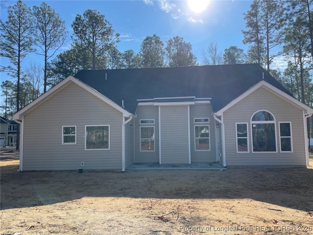 209 August Lane Raeford, NC 28376 - Photo 3 of 20 a view of a house with a yard