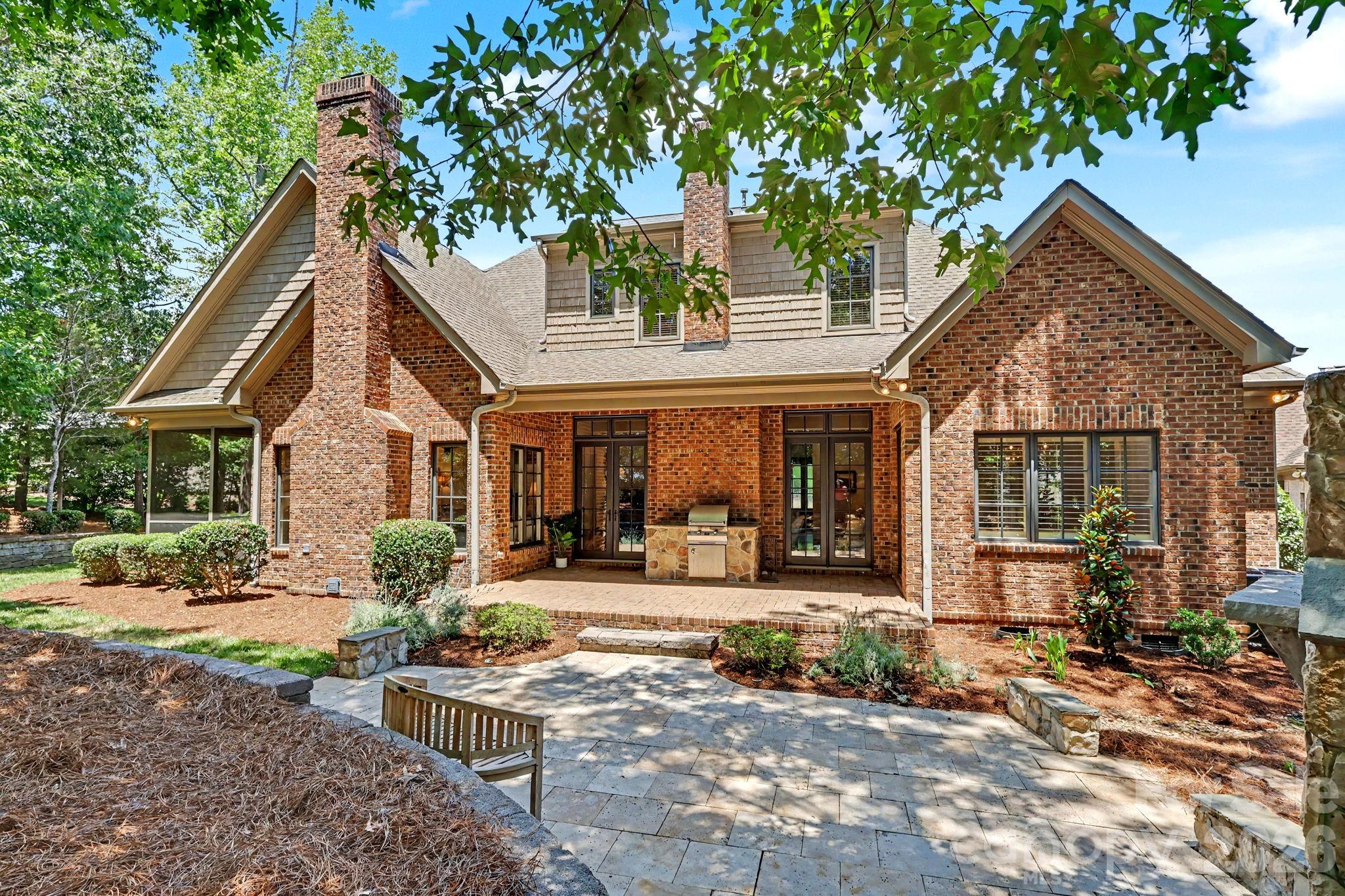 508 Hideaway Ridge Court Matthews, NC 28105 - Photo 40 of 47 a front view of a house with garden