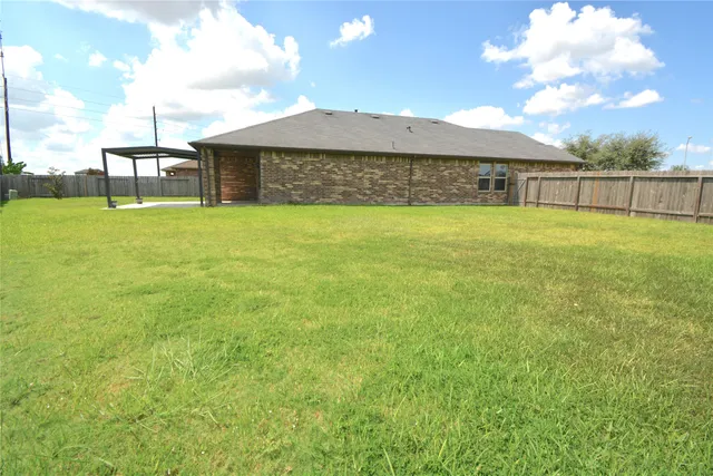 a view of a backyard with a garden
