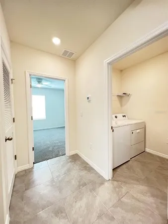a view of a bathroom with a bathtub and a sink