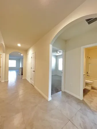 a view of a big room with closet and wooden floor
