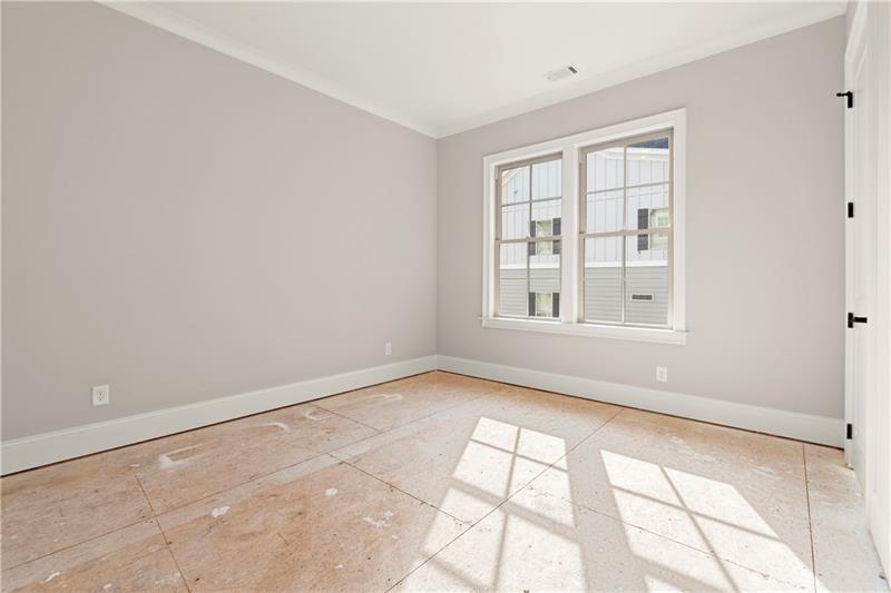 222 Trecastle Square, Unit 21 Canton, GA 30114 - Photo 13 of 45 a view of an empty room with a window