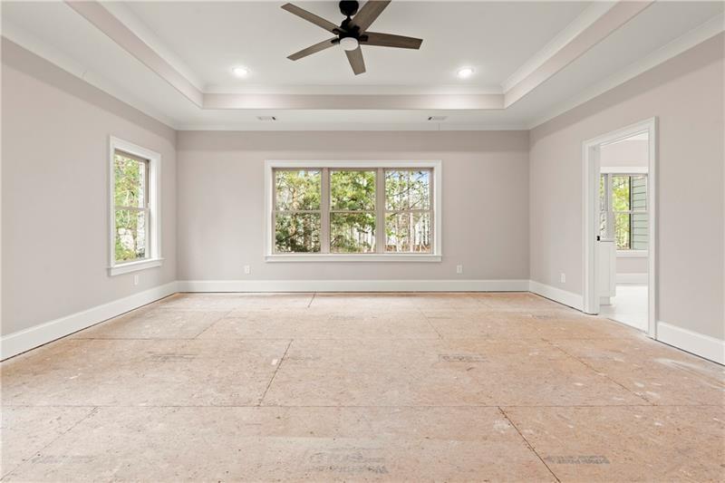 222 Trecastle Square, Unit 21 Canton, GA 30114 - Photo 21 of 45 a view of an empty room with a window