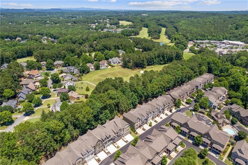 222 Trecastle Square, Unit 21 Canton, GA 30114 - Photo 38 of 45 an aerial view of a city with lots of residential buildings
