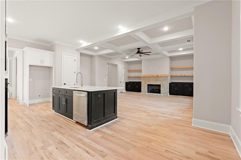 222 Trecastle Square, Unit 21 Canton, GA 30114 - Photo 5 of 45 a view with kitchen island wooden floor and a window