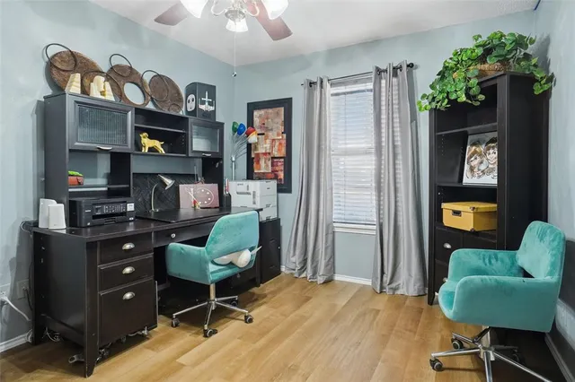 a workspace with furniture and window