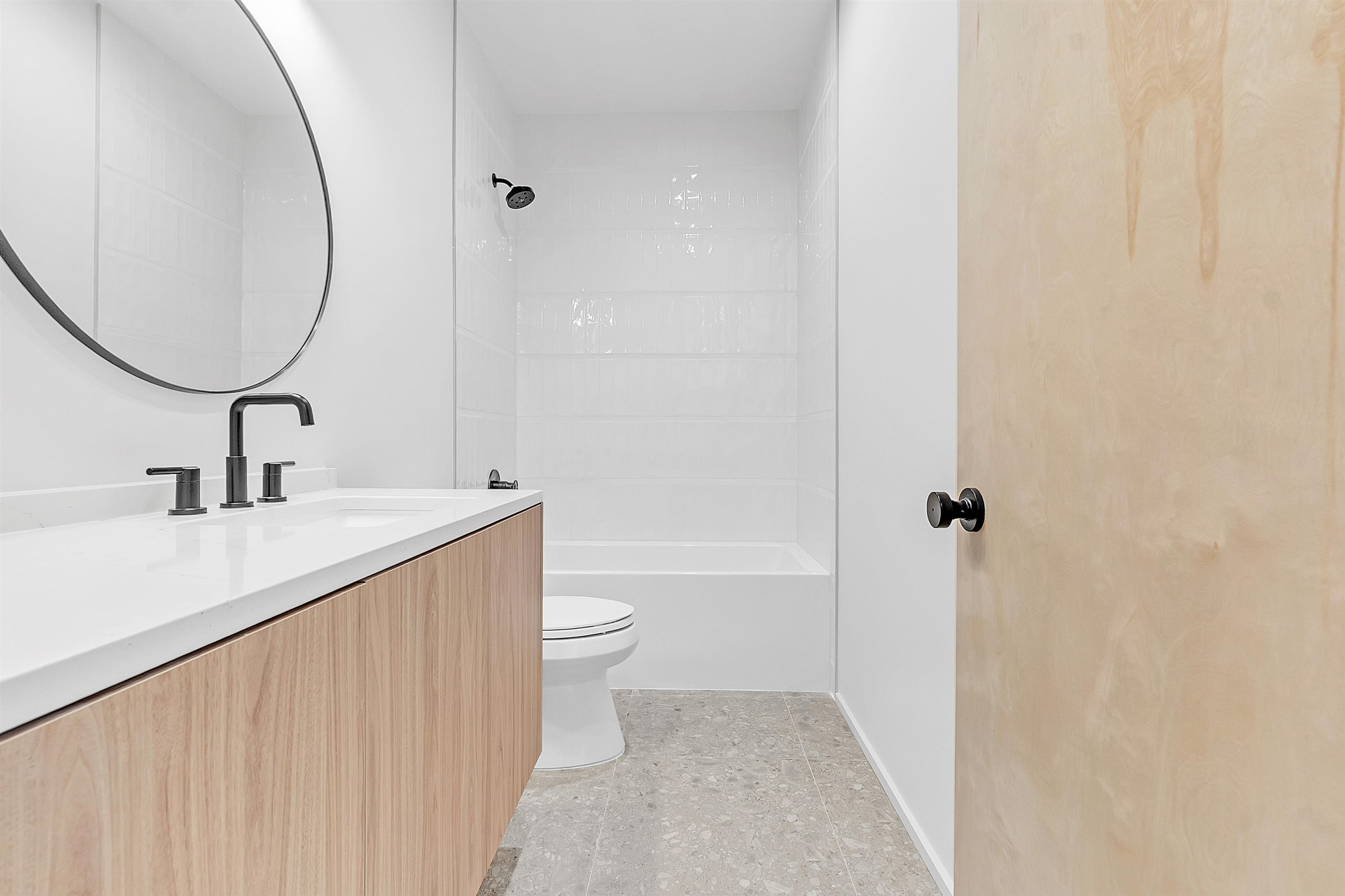 38 Angelus Street Memphis, TN 38104 - Photo 27 of 39 a bathroom with a sink a toilet and a mirror