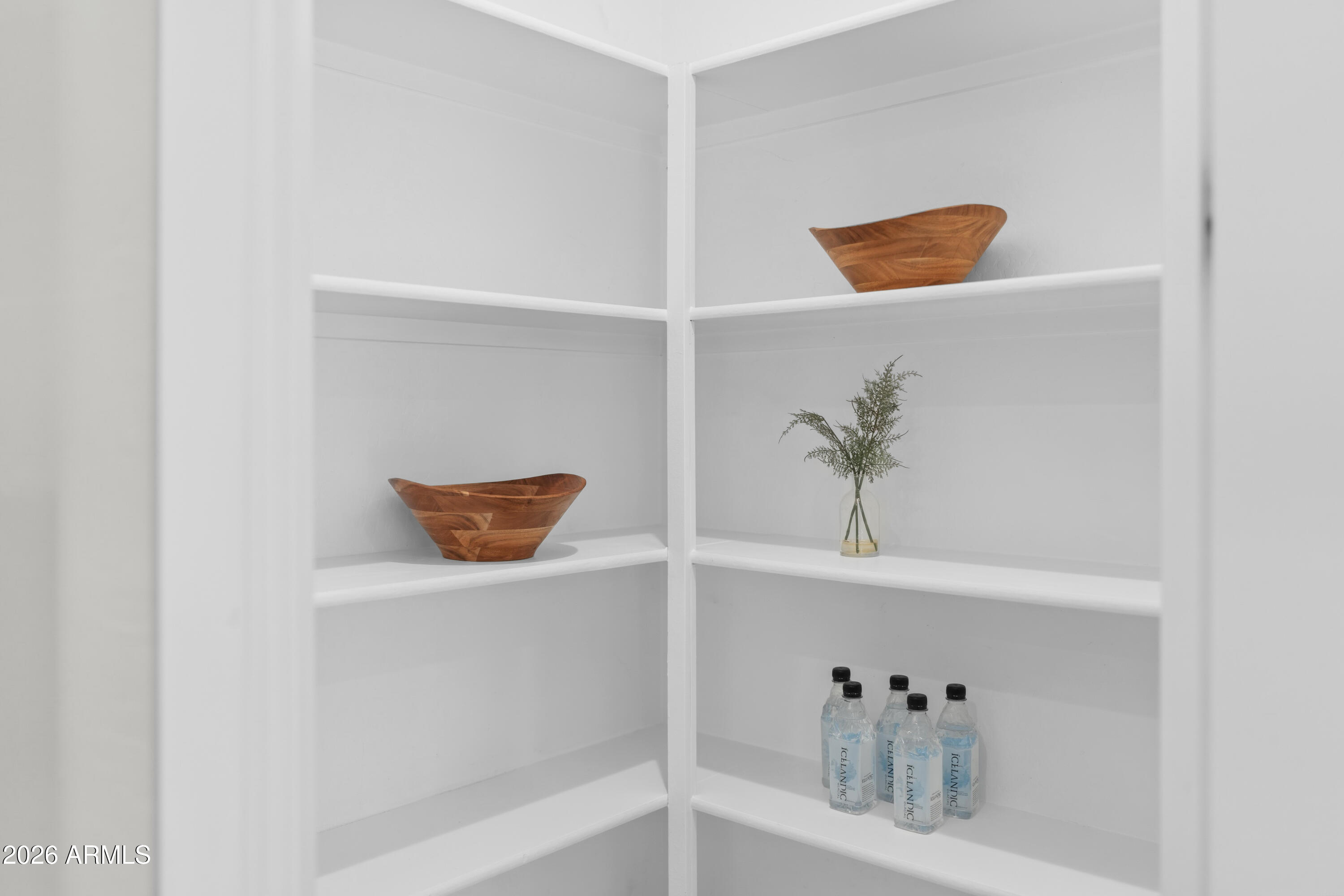 15754 West Madison Street Goodyear, AZ 85338 - Photo 12 of 35 a view of a hallway with closet
