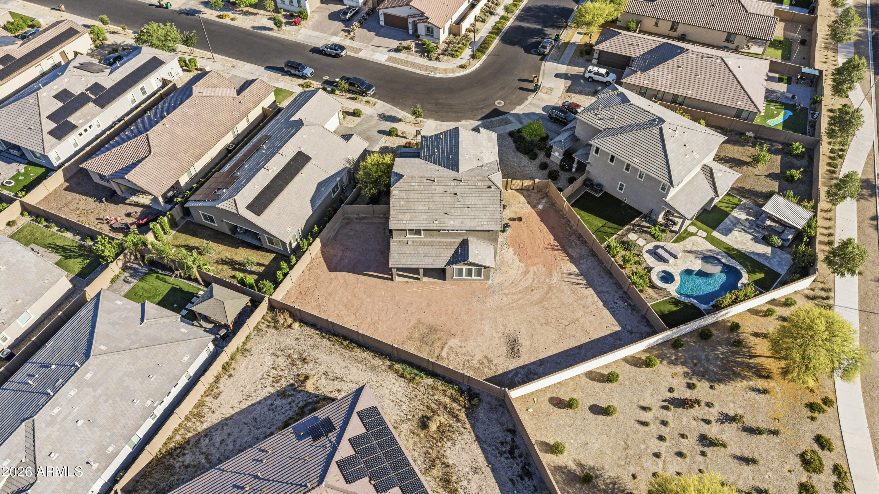 15754 West Madison Street Goodyear, AZ 85338 - Photo 3 of 35 an aerial view of a house with a garden