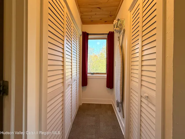 a bathroom with a bathtub and shower curtain