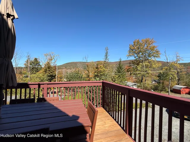 a view of living room with furniture and a window