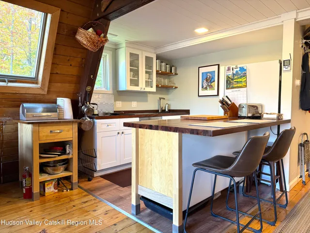 a bathroom with a toilet sink and shower
