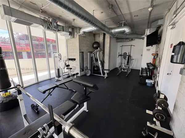 a view of a room with gym equipment