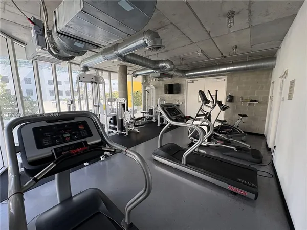 a view of a room with gym equipment