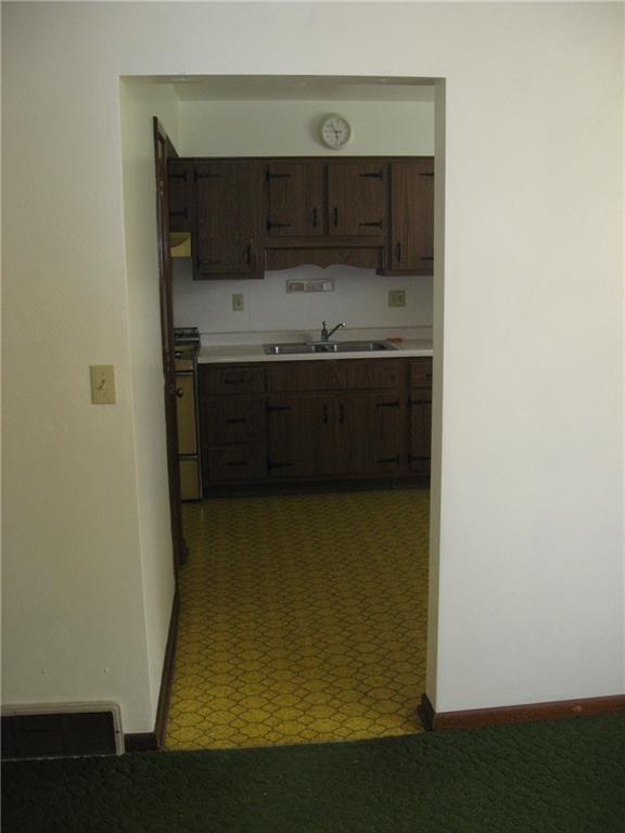 2591 Slope Hill Road Mount Pleasant, PA 15666 - Photo 8 of 12 Living room looking into the kitchen.