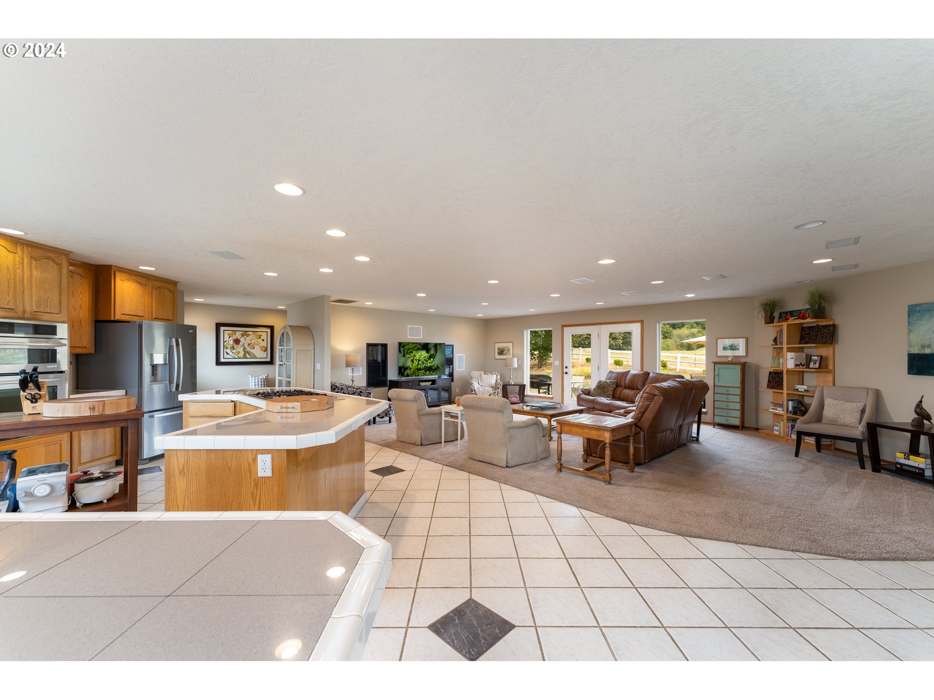 15680 Northeast Yamhill Road Yamhill, OR 97148 - Photo 23 of 47 a living room with furniture a large window and table