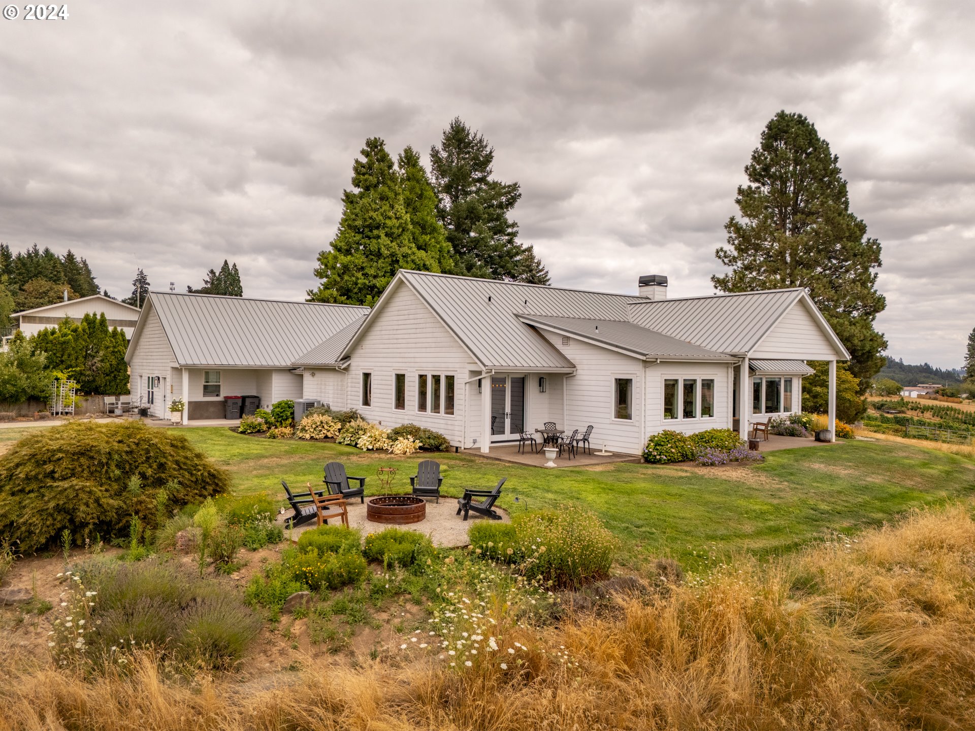 15680 Northeast Yamhill Road Yamhill, OR 97148 - Photo 35 of 47 a front view of a house with garden