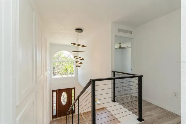 a bathroom with a bathtub and window