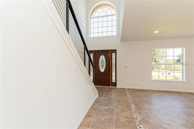 a kitchen with a sink stove and microwave