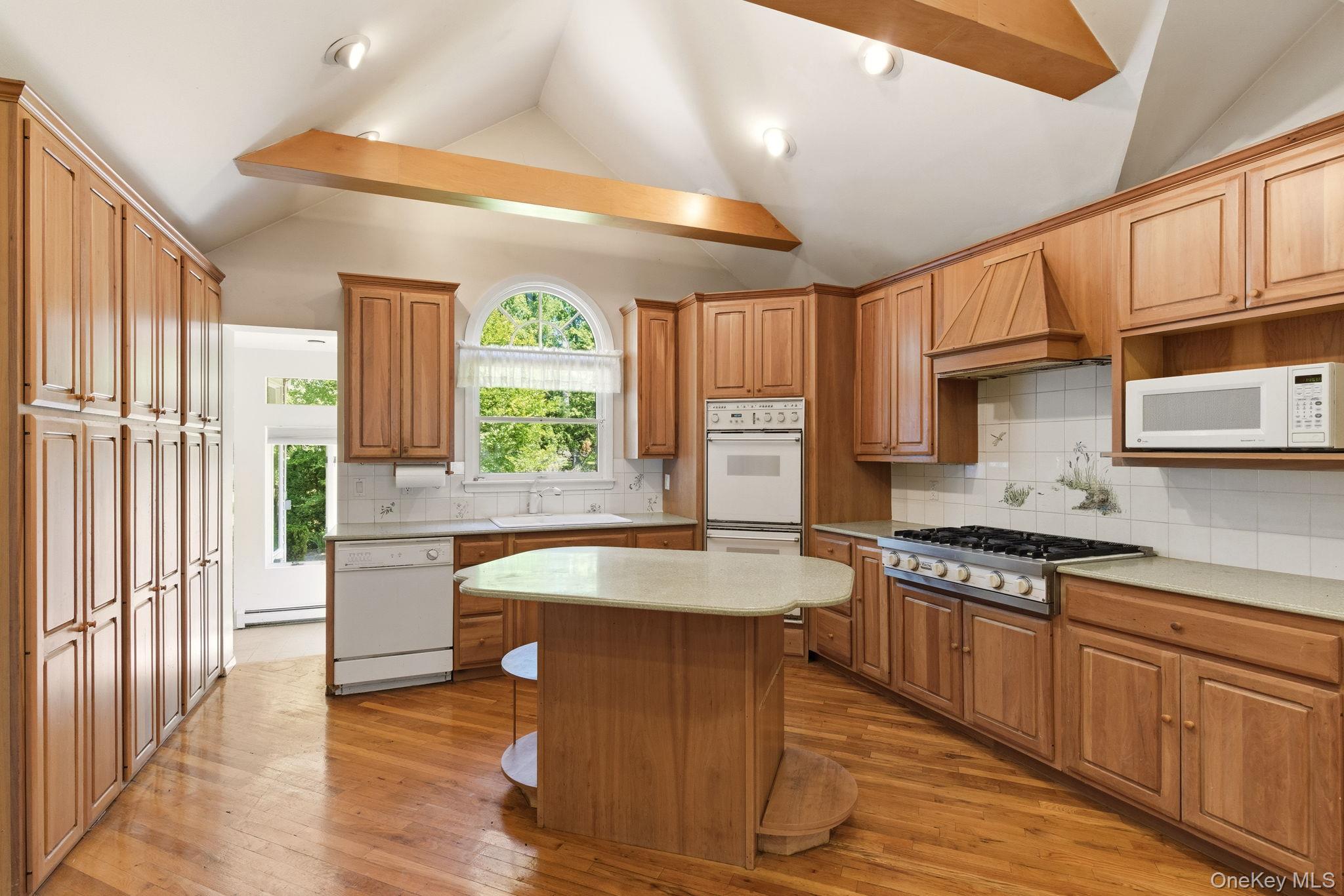 380 Duck Pond Road Locust Valley, NY 11560 - Photo 15 of 41 All gas cooking, large kitchen with tons of cabinetry