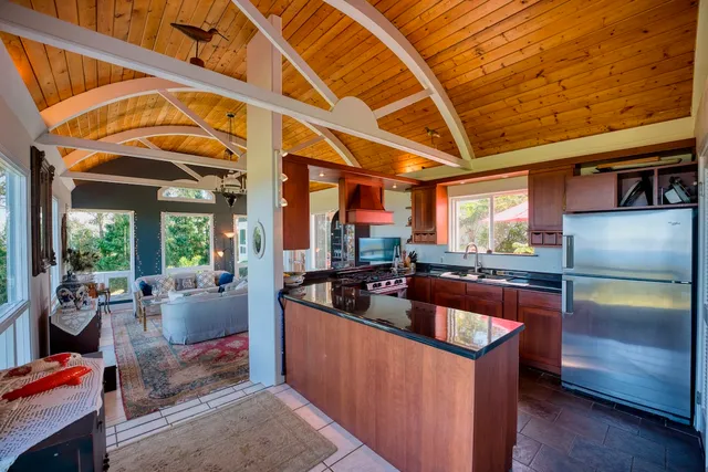 a kitchen with granite countertop lots of counter top space