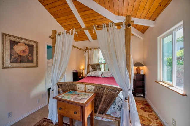 a dining room with a table and chairs