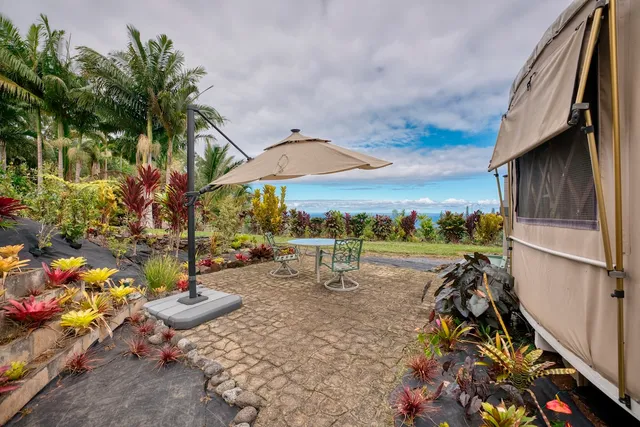a view of a houses with a yard