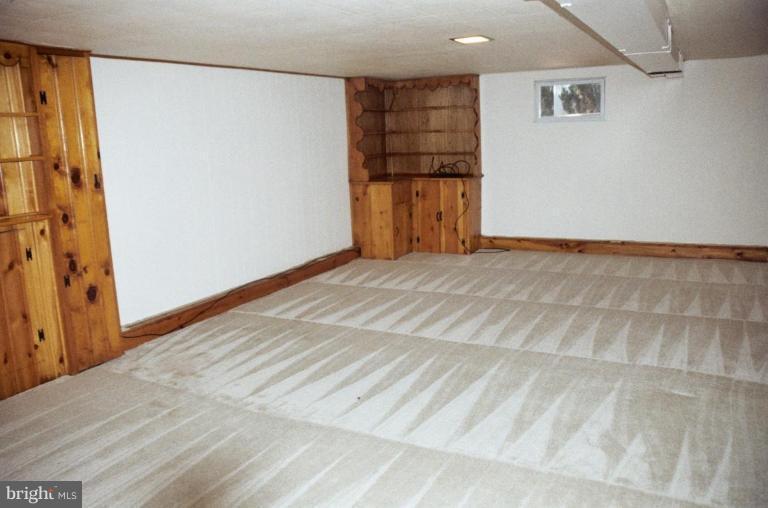 7426 Flora Street Springfield, VA 22150 - Photo 12 of 16 a view of empty room with wooden floor