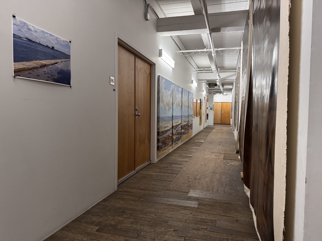 249 A Street, Unit 61 Boston, MA 02210 - Photo 8 of 21 a view of hallway with stairs