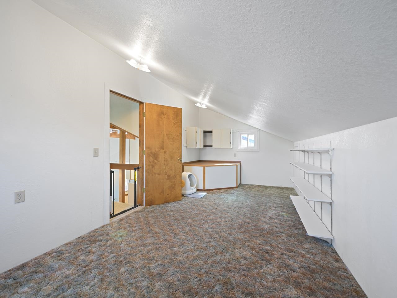 750 Pinyon Court Fruita, CO 81521 - Photo 11 of 40 a view of livingroom with kitchen and white cabinets