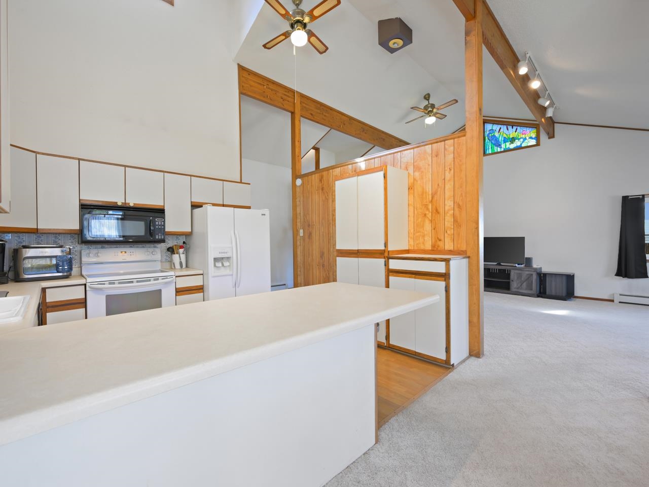 750 Pinyon Court Fruita, CO 81521 - Photo 14 of 40 a kitchen with stainless steel appliances a refrigerator and a stove top oven