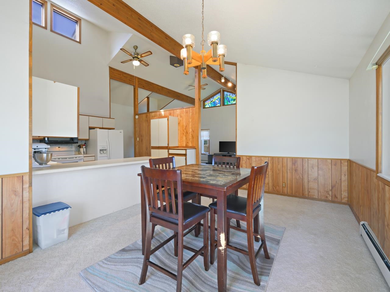 750 Pinyon Court Fruita, CO 81521 - Photo 16 of 40 a view of a dining room with furniture and a chandelier