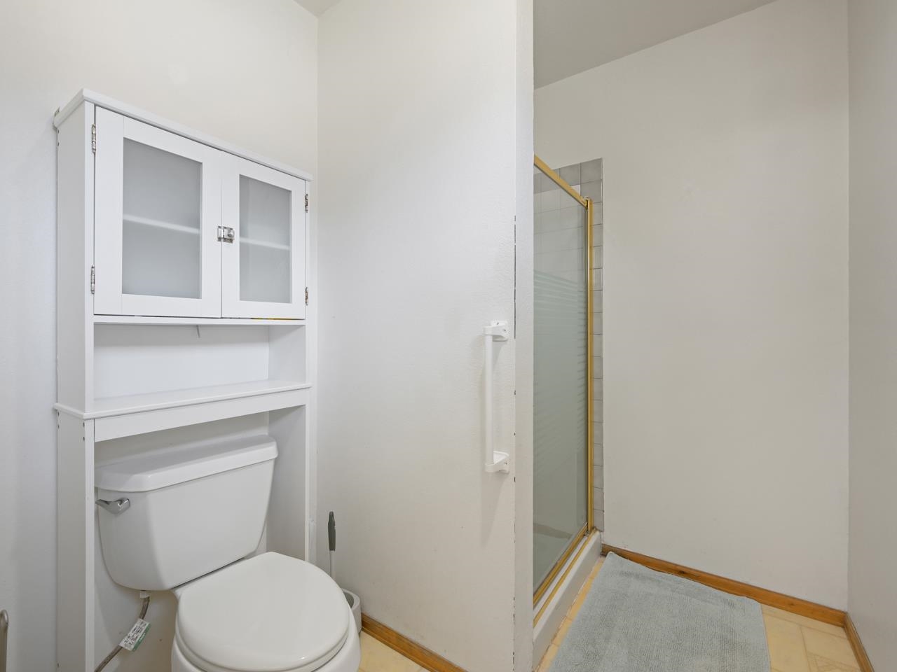 750 Pinyon Court Fruita, CO 81521 - Photo 21 of 40 a white toilet sitting next to a bathroom sink