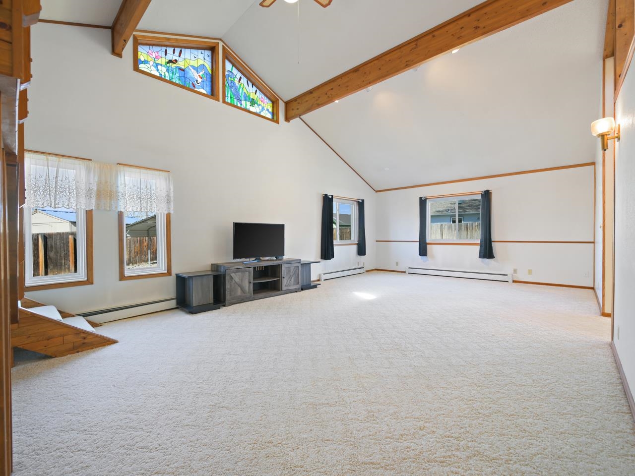 750 Pinyon Court Fruita, CO 81521 - Photo 6 of 40 a view of a livingroom with an empty space and a fireplace