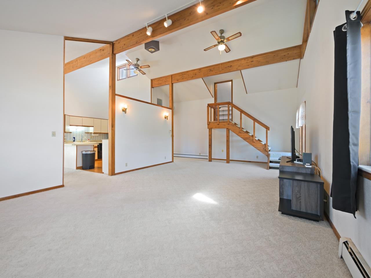 750 Pinyon Court Fruita, CO 81521 - Photo 8 of 40 a view of a livingroom with furniture and staircase