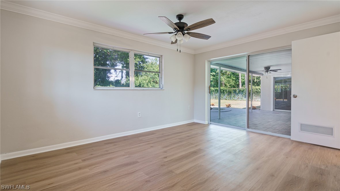 8631 Exeter Street Fort Myers, FL 33907 - Photo 11 of 23 a view of an empty room with a window