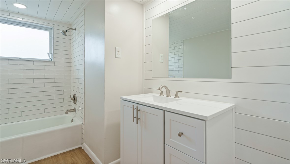 8631 Exeter Street Fort Myers, FL 33907 - Photo 15 of 23 a bathroom with a sink and a bathtub