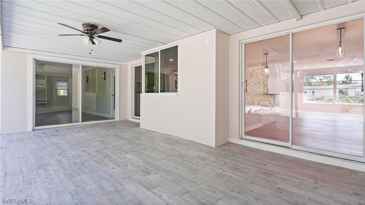 8631 Exeter Street Fort Myers, FL 33907 - Photo 18 of 23 a view of livingroom with hardwood floor and a ceiling fan