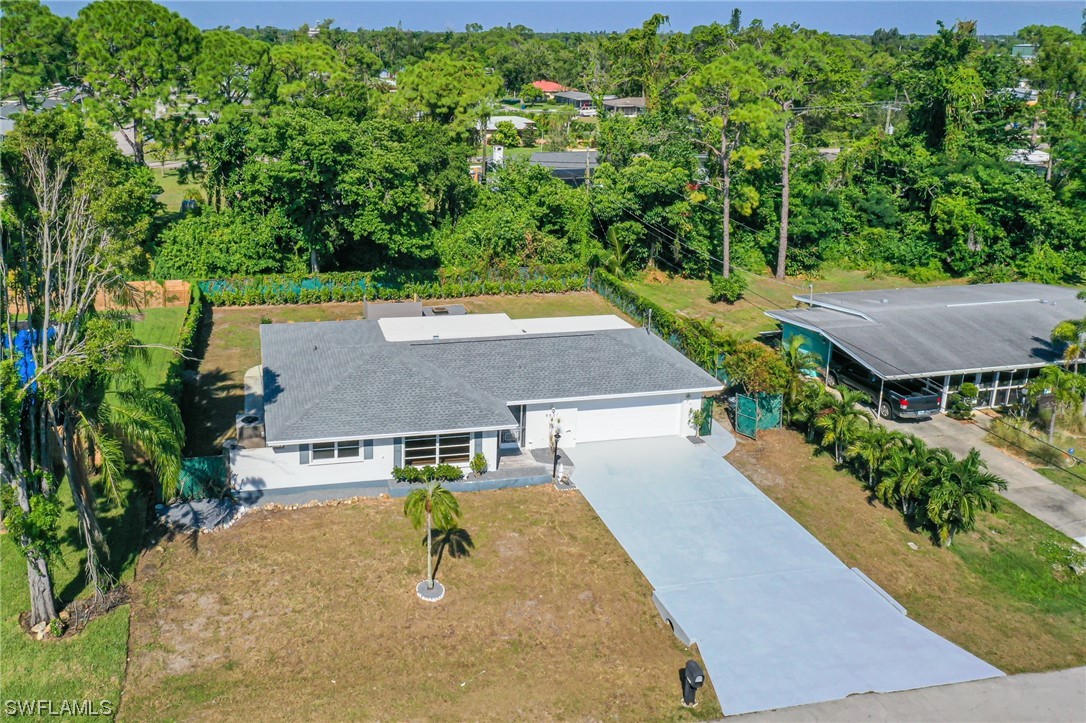 8631 Exeter Street Fort Myers, FL 33907 - Photo 23 of 23 an aerial view of a house