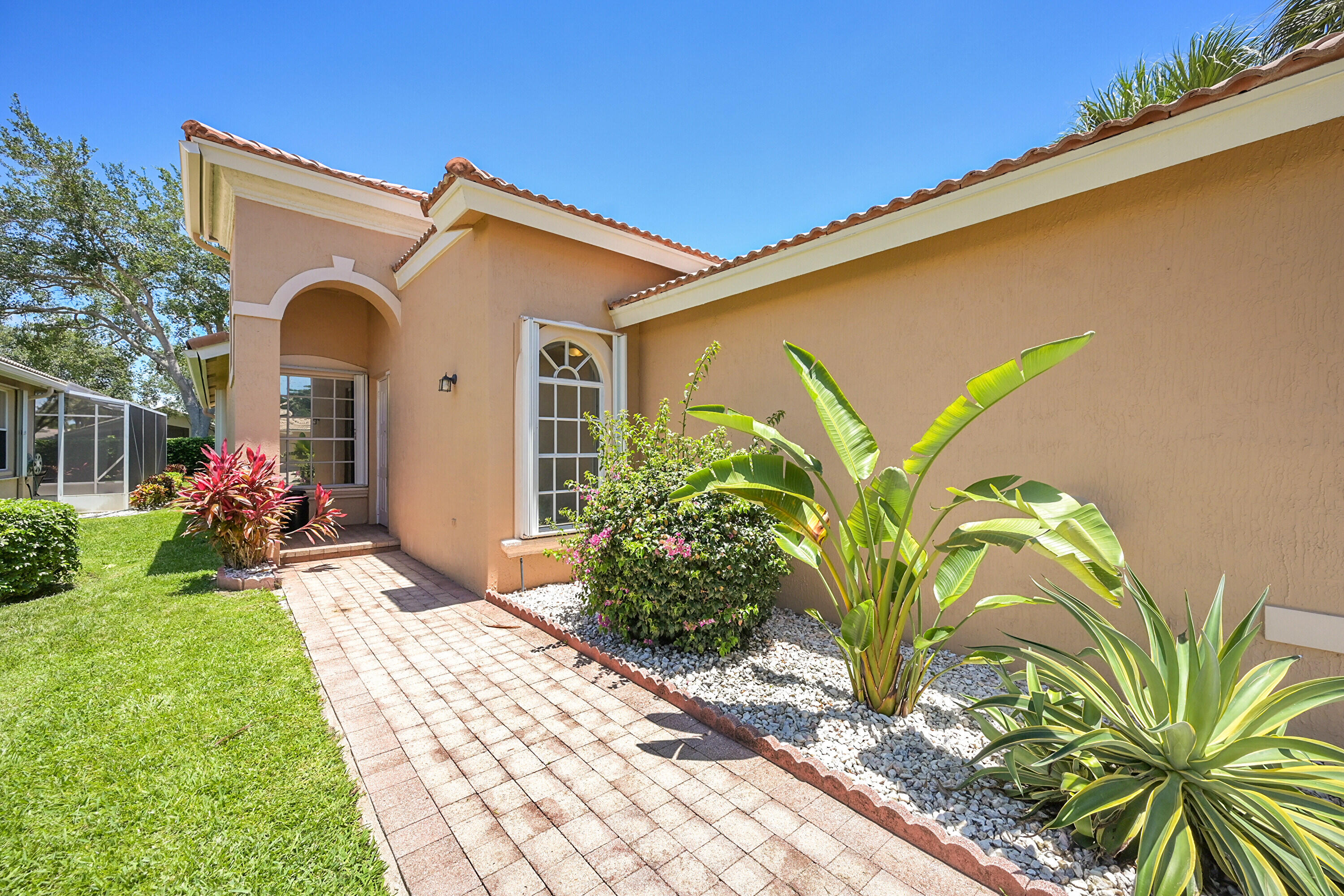 7075 Vía Genova Delray Beach, FL 33446 - Photo 2 of 30 Front Walkway