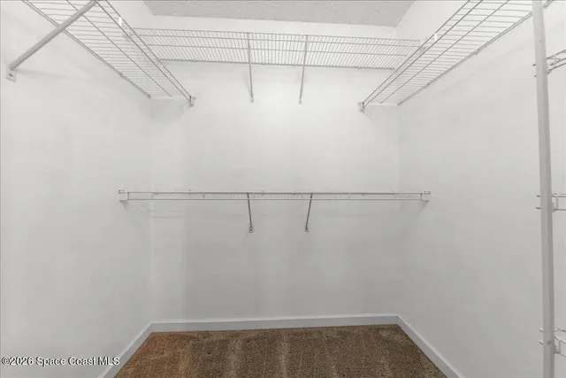 a view of a room with racks on the wall